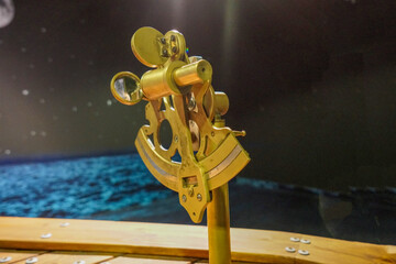 Closeup of an old sextant, doubly reflecting navigation instrument