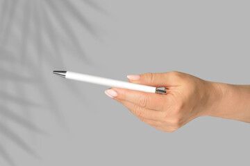Pen in hand. Classic mock- up for branding, sale and design