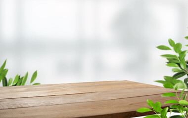 empty wooden table on background of abstract blur white interior, montage, product display, inside and window..