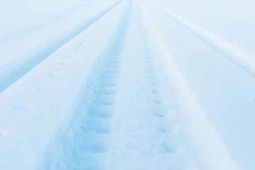 snow track imprint of snowmobile, close-up view