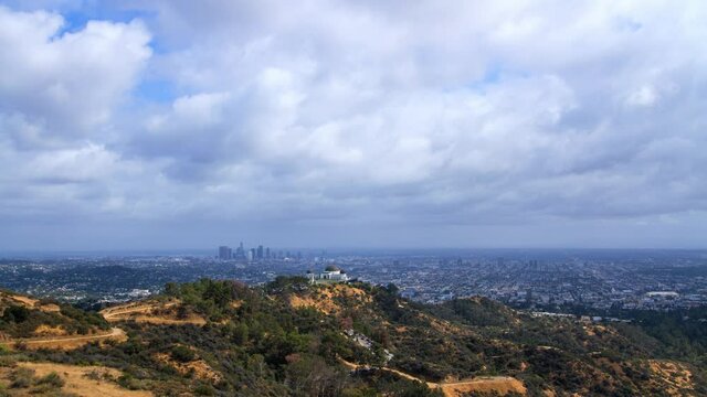 Time Lapse Lockdown Shot Of Clouds Moving Above Griffith Park, Popular Landmark In City - Los Angeles, California