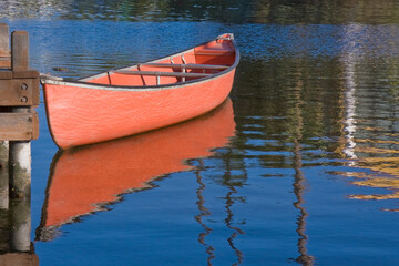 Red Boat and Reflection