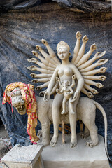 Clay idol of Goddess Devi Durga is in preparation for the upcoming Durga Puja festival at a pottery...