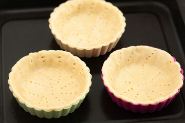 Preparation of dough for a delicious cheese and ham tartlet