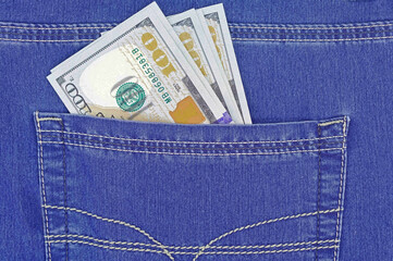 dollar bills in jeans pocket close-up