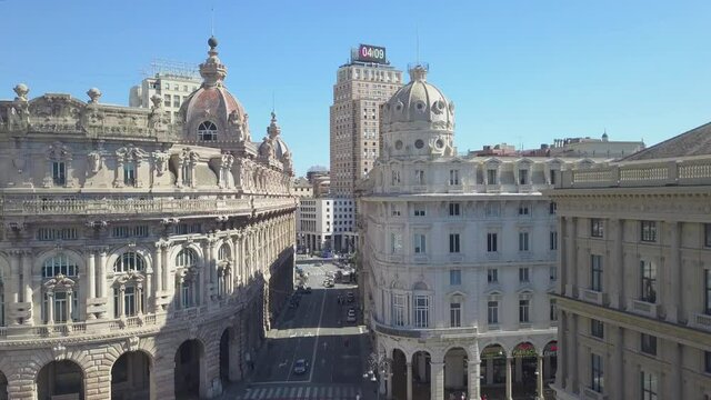 Aerial panoramic drone view of De Ferrari square in Genoa, Italy.Central part of the city, aerial view. In the background the Palazzo della Borsa and buildngs.4K video