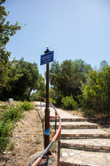 wooden signpost in Gallikos Molos Beach sivota