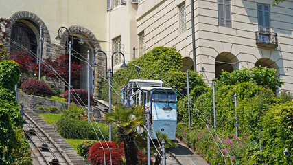 Bergamo, Italy. The red funicular connects the new city with the old one for more 120 years. It...