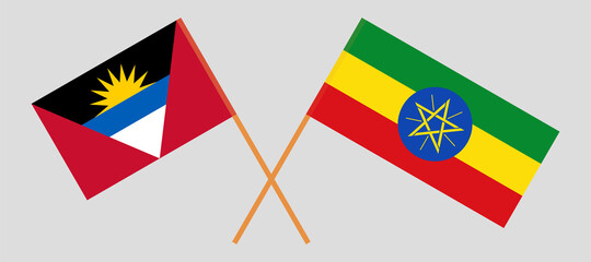 Crossed flags of Antigua and Barbuda and Ethiopia. Official colors. Correct proportion