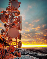 telecommunication pole at dawn