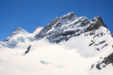 Fototapeta na wymiar Jungfraujoch Top of Europe, view of the Jungfrau mountain. Wonderful glacier world above grindelwald switzerland