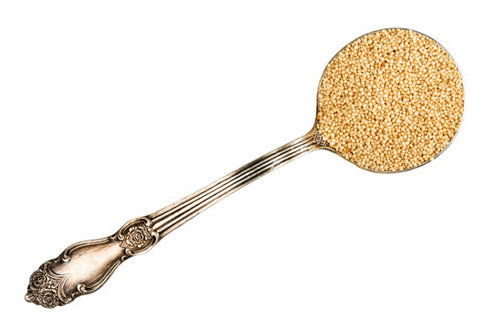 top view of amaranth grain in tablespoon cutout