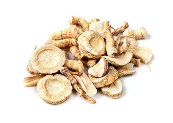 handful of dried parsley roots closeup on white