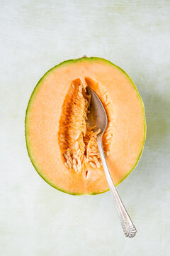 Cantaloupe and spoon
