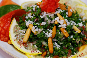 fresh green parsley salad with tomatoes and pine nuts, lebanese food