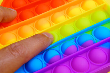 Pop it fidget. Colorful toy push pop it. Close up. Selective focus