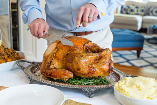 Man Carving Turkey 