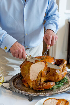 Man carving turkey 