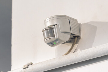 Indoor wall motion or light sensor for indoor lighting control