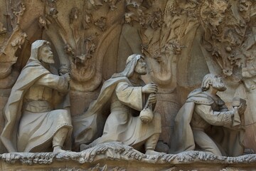 Obraz premium Carved statues on the exterior façade of Sagrada Familia cathedral in Barcelona in Spain