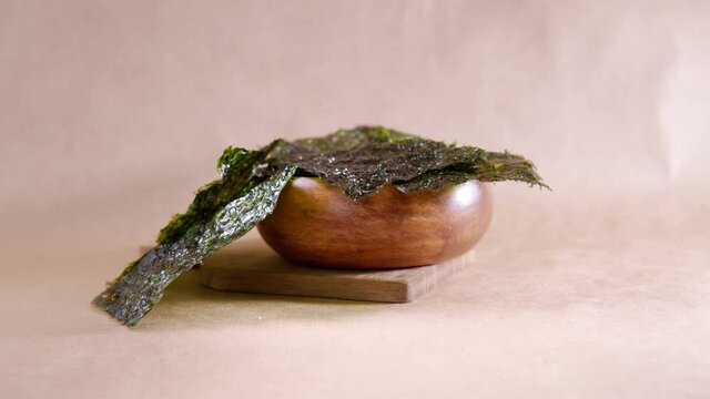 Japanese food nori dry seaweed or edible seaweed close-up.