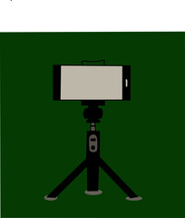 camera on tripod with green screen background