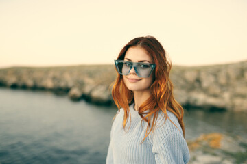 woman with glasses outdoors landscape island travel