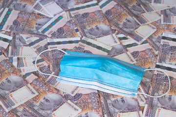 20000 Cambodia Real bills and mask