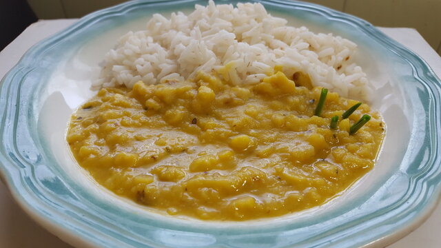 A plate of Trinidad and Tobago's cooked Dall or Dal, Dhal (Split peas) and Rice.  