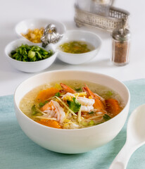 Shrimp porridge white bowl on the table