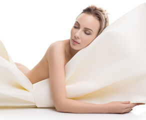 Fototapeta premium Nude pretty girl and a huge bow in her hands
