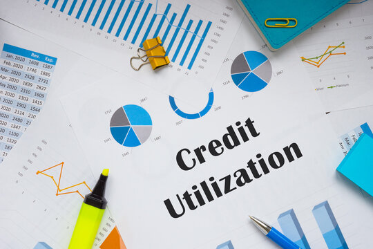 Business concept meaning Credit Utilization with sign on the piece of paper.
