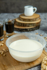 Kembang Tahu or Douhua  is a Chinese snack made with very soft tofu. kembang tahu is ginger drink and contains beancurd (tofu) made from soybean juice and palm sugar syrup