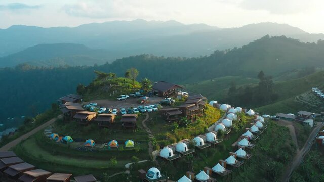 Aerial view of camping grounds and tents on Doi Mon Cham mountain in Mae Rim, Chiang Mai province, Thailand