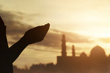 Silhouette of hands muslim man praying