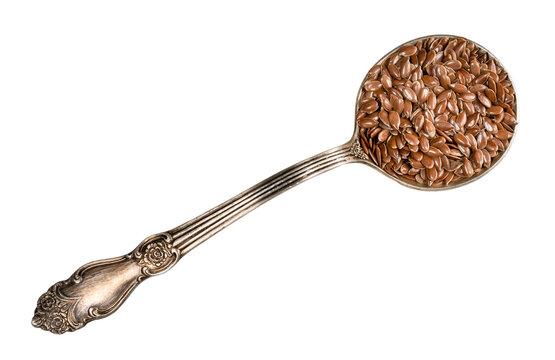 top view of brown flax seeds in tablespoon cutout