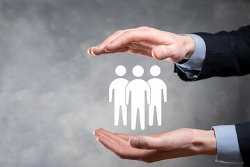Businessman hold teamwork icon. Building a strong team. people icon. Human resources and management concept. social networking, assessment center concept, personal audit or CRM concept.
