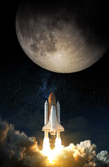 Space Shuttle takes off to the moon. Elements of this image furnished by NASA.