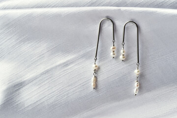 Creative dangle earrings with small pearls