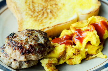Close up of homemade pork steak and fried eggs for food backgrounds