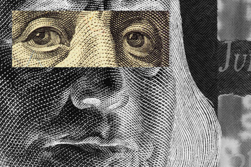 Franklin's face close-up with a stripe of censorship on his eyes on a 100 dollar bill. Unusual, partially black and white, illustration.  American economy and public debt. Macro