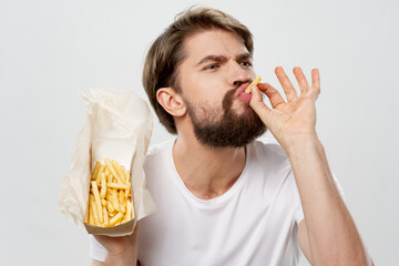 bearded man french fries fast food delicious