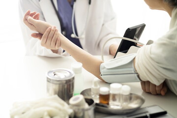 Doctor measuring blood pressure, Medicine concept