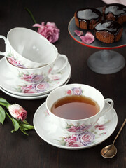 Fototapeta premium cup of tea and flowers