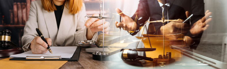 justice and law concept.Male judge in a courtroom on wooden table and Counselor or Male lawyer...