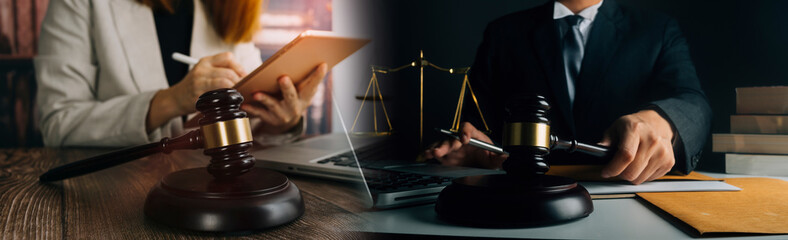 justice and law concept.Male judge in a courtroom on wooden table and Counselor or Male lawyer working in office. Legal law, advice and justice concept.