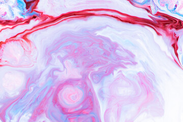 Abstract gradient colorful background. Multicolor trendy backdrop. Stains of paint on the water. Fluid art