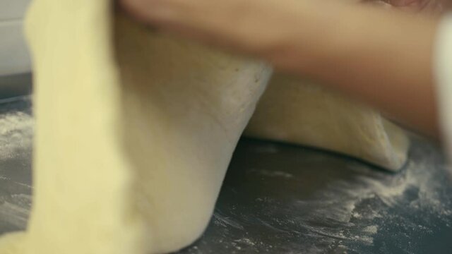 Rolls out the dough