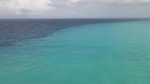 Vibrant Blue and Turquoise Caribbean Ocean Waters in Cancun, Mexico - Aerial