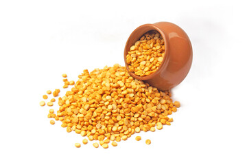 Yellow Dal in bowl isolated on white background. Vegetarian Indian chana dal. Yellow Pulses, Chana dal, Pulses, Uncooked pulses, Yellow Beans